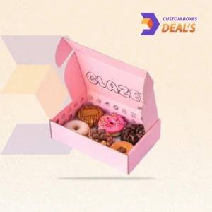 stacked pink donut boxes ready for bakery counter display