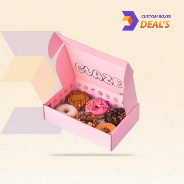 stacked pink donut boxes ready for bakery counter display