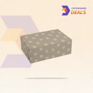Branded wrapping paper with custom logos and designs for professional gift and product packaging.